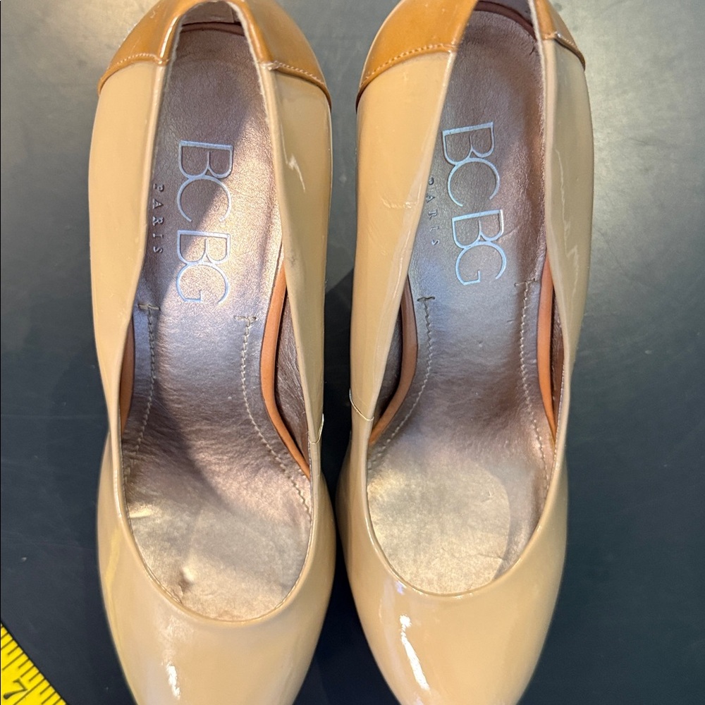 BCBG Paris Nude Patent Leather Platform Pumps
Size 6.5 - Picture 9 of 10